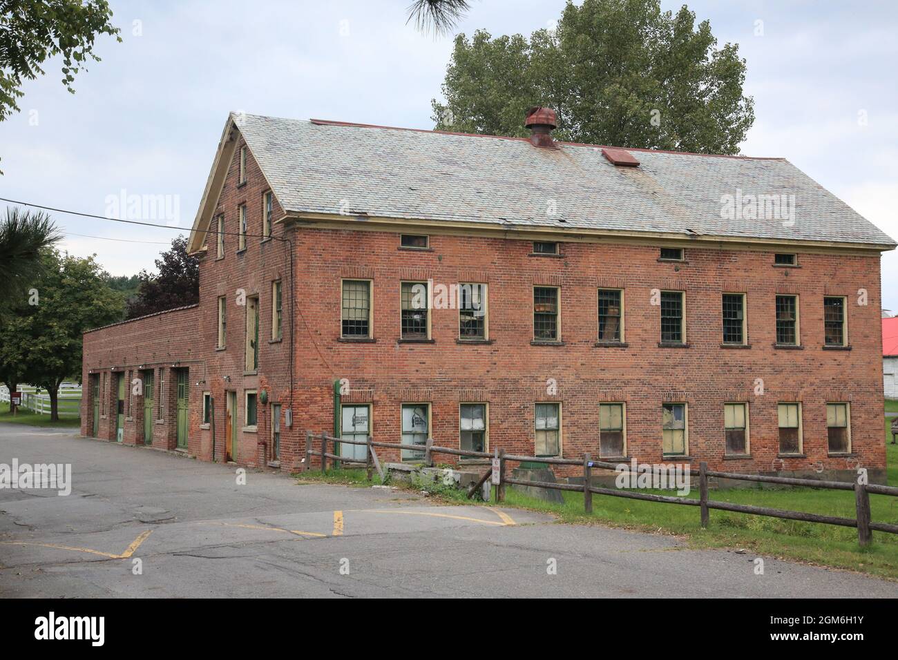 Buildings and people on the grounds of the first Shaker settlement in
