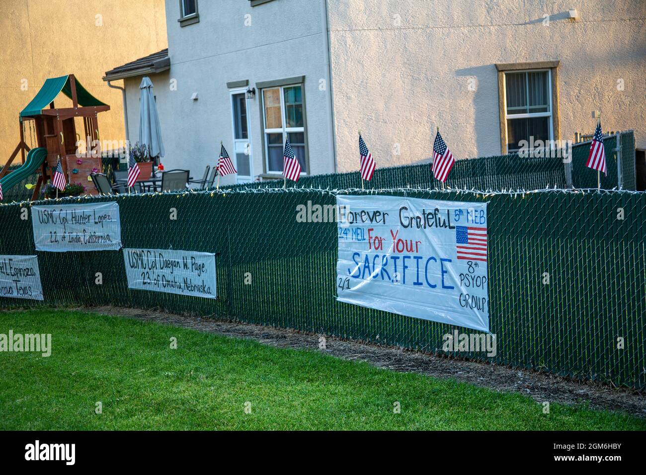 American flags and tribute messages to fallen U.S. service members