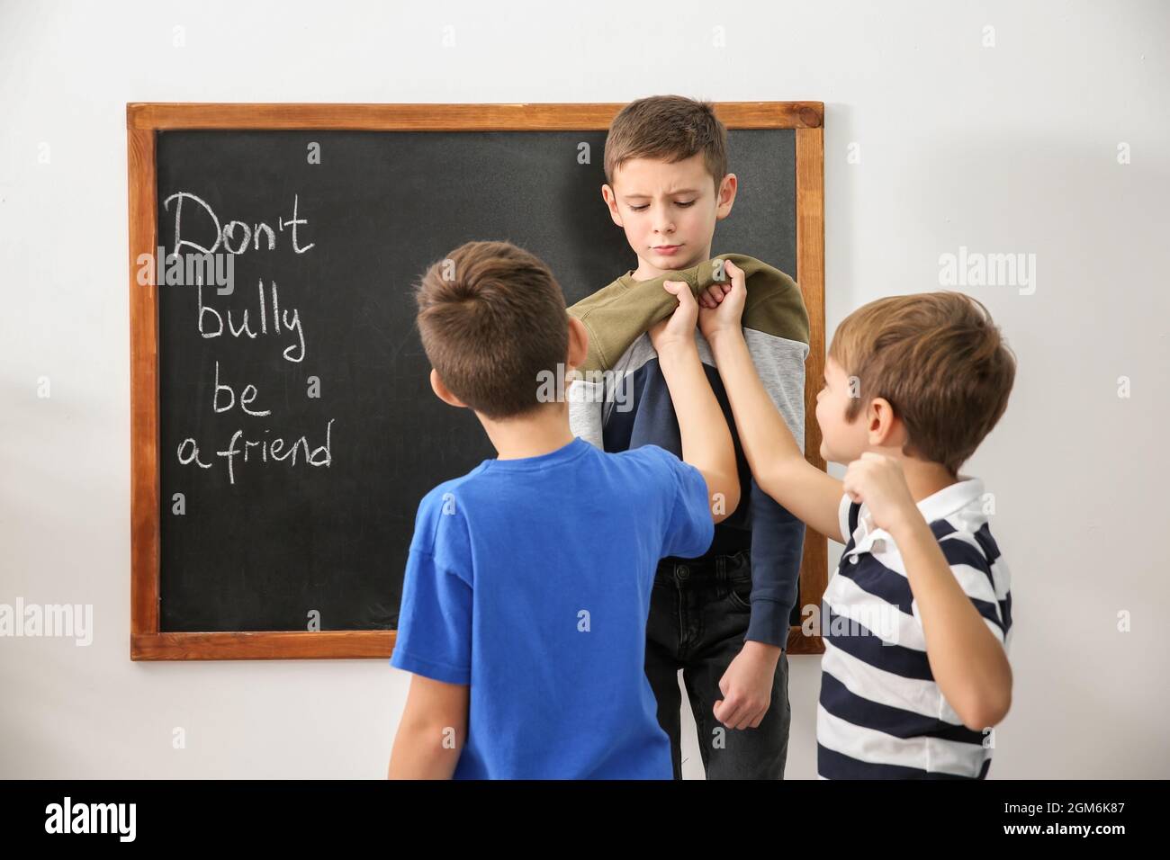Boys bullying their classmate in school Stock Photo Alamy