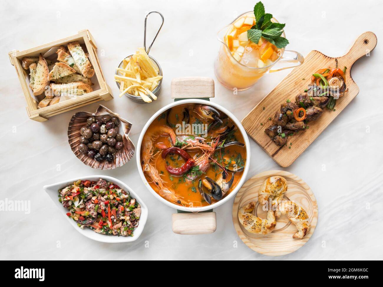 mixed spanish gourmet tapas sharing set selection on restaurant table in  barcelona Stock Photo - Alamy