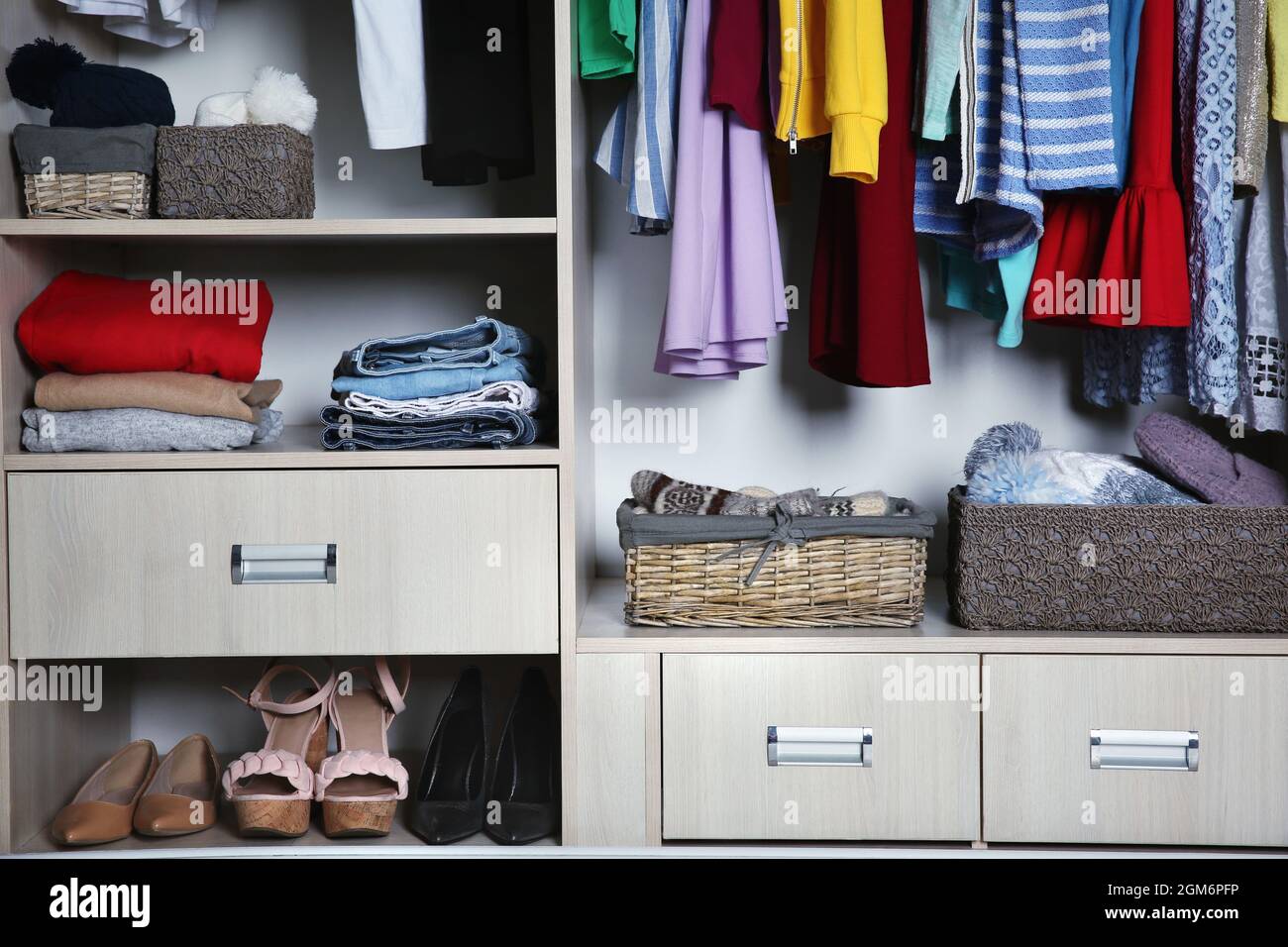 Wardrobe with many different clothes, closeup Stock Photo Alamy