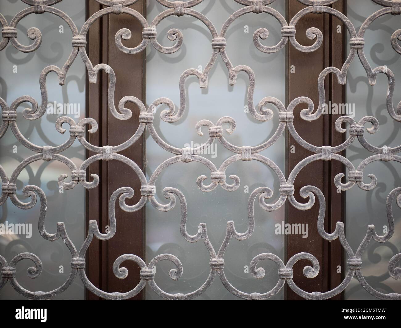 wrought iron protective grate of a window Stock Photo Alamy