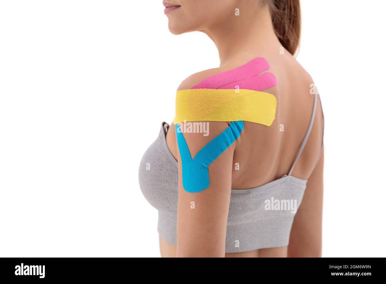 Physiotherapy treatment with therapeutic tape for shoulder pain, aches