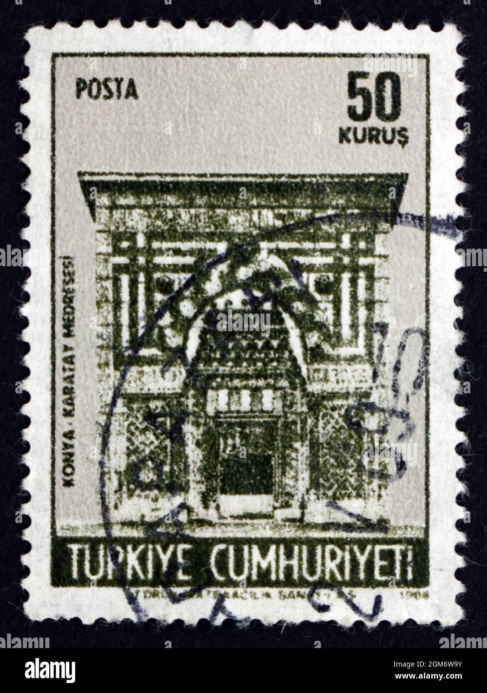 TURKEY - CIRCA 1968: a stamp printed in the Turkey shows Karatay Medresse, University Gate, Konya, circa 1968 Stock Photo