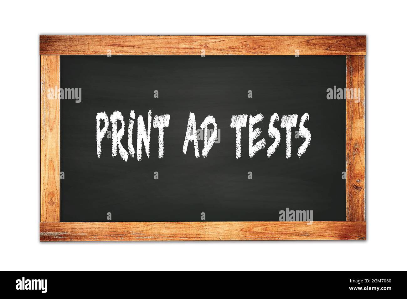 PRINT AD TESTS text written on black wooden frame school blackboard