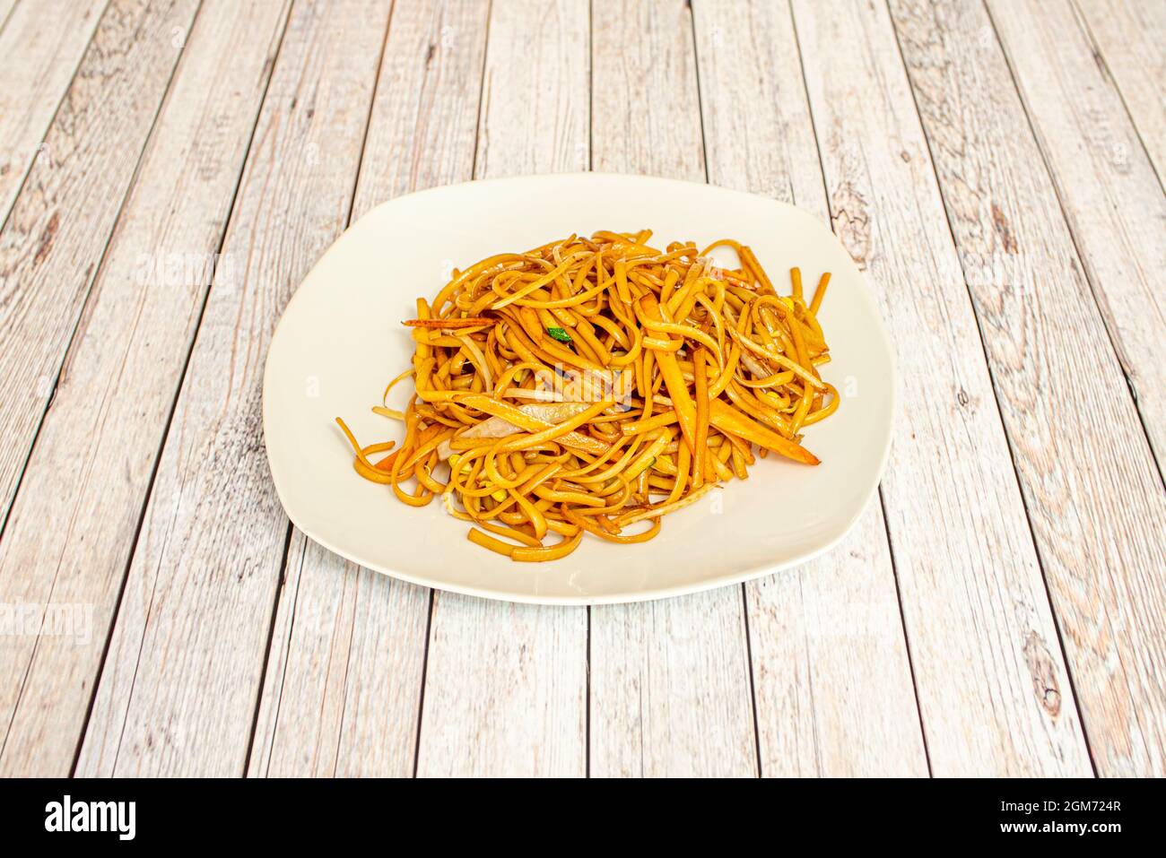 Simple noodles sauteed with vegetables cooked in a Chinese restaurant