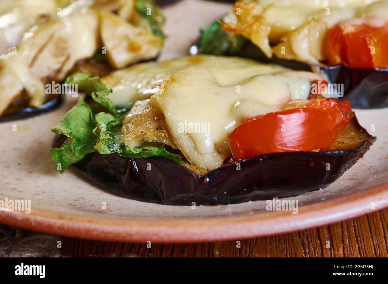 Melanzane al forno Baked eggplant with anchovies and cheese Stock Photo