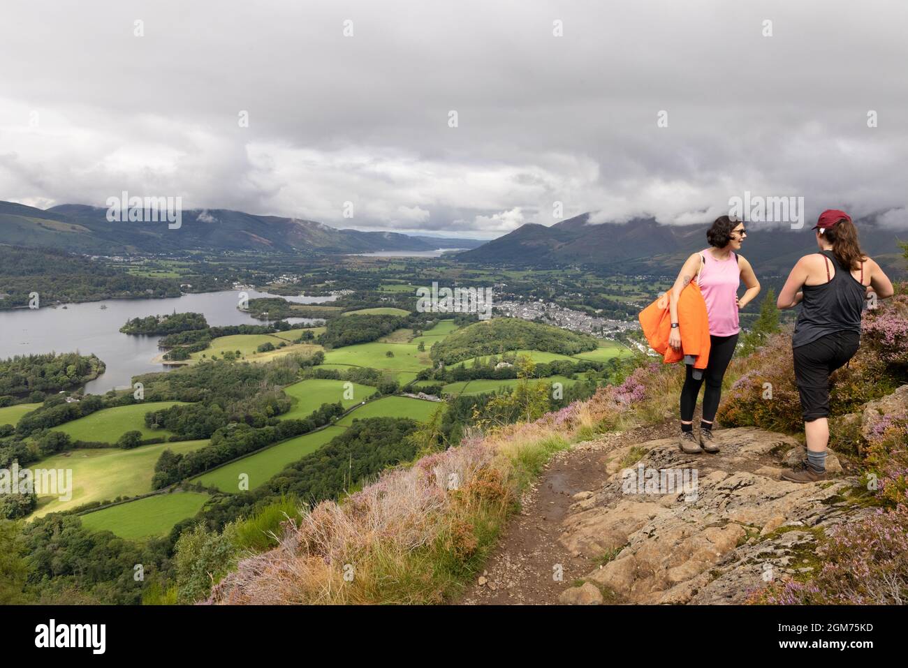 Lake District walking; two women walkers on Walla Crag near Keswick, Lake District National Park, Cumbria UK Stock Photo