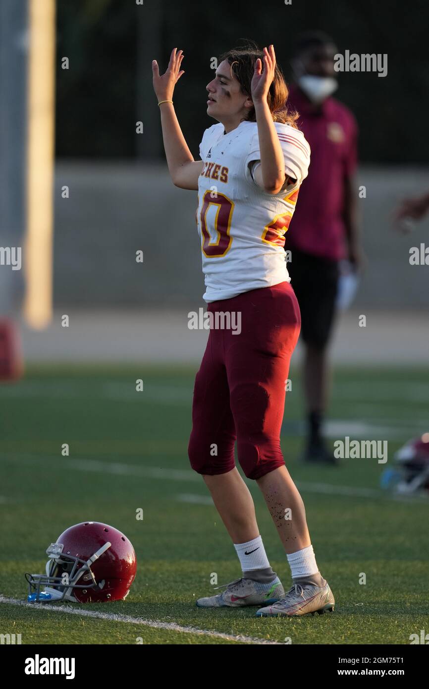 Arcadia Apaches punter Kayla Ibrahim (20) stretches during a high school football game against La Salle Spartans, Thursday, Sept. 16, 2021, in Pasaden Stock Photo