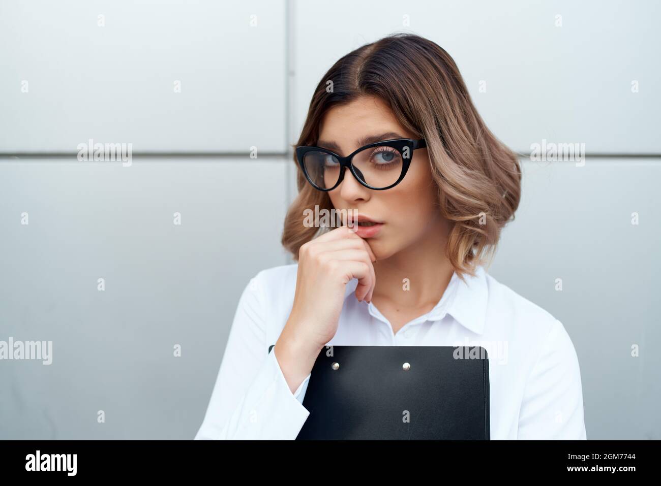 cheerful woman in white shirt documents office official businesswoman ...