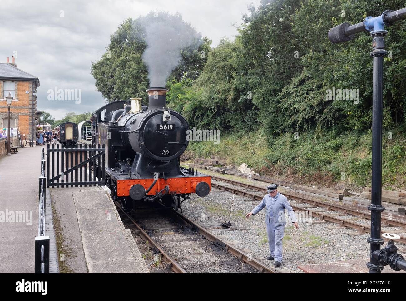 Vintage train;  steam engine manoeuvring in North Weald Station, Epping Ongar railway, a heritage railway, Epping Essex UK Stock Photo
