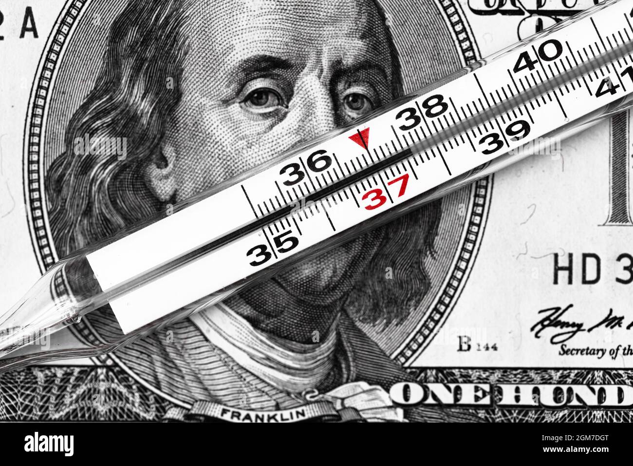 100 dollar bill and thermometer Stock Photo Alamy