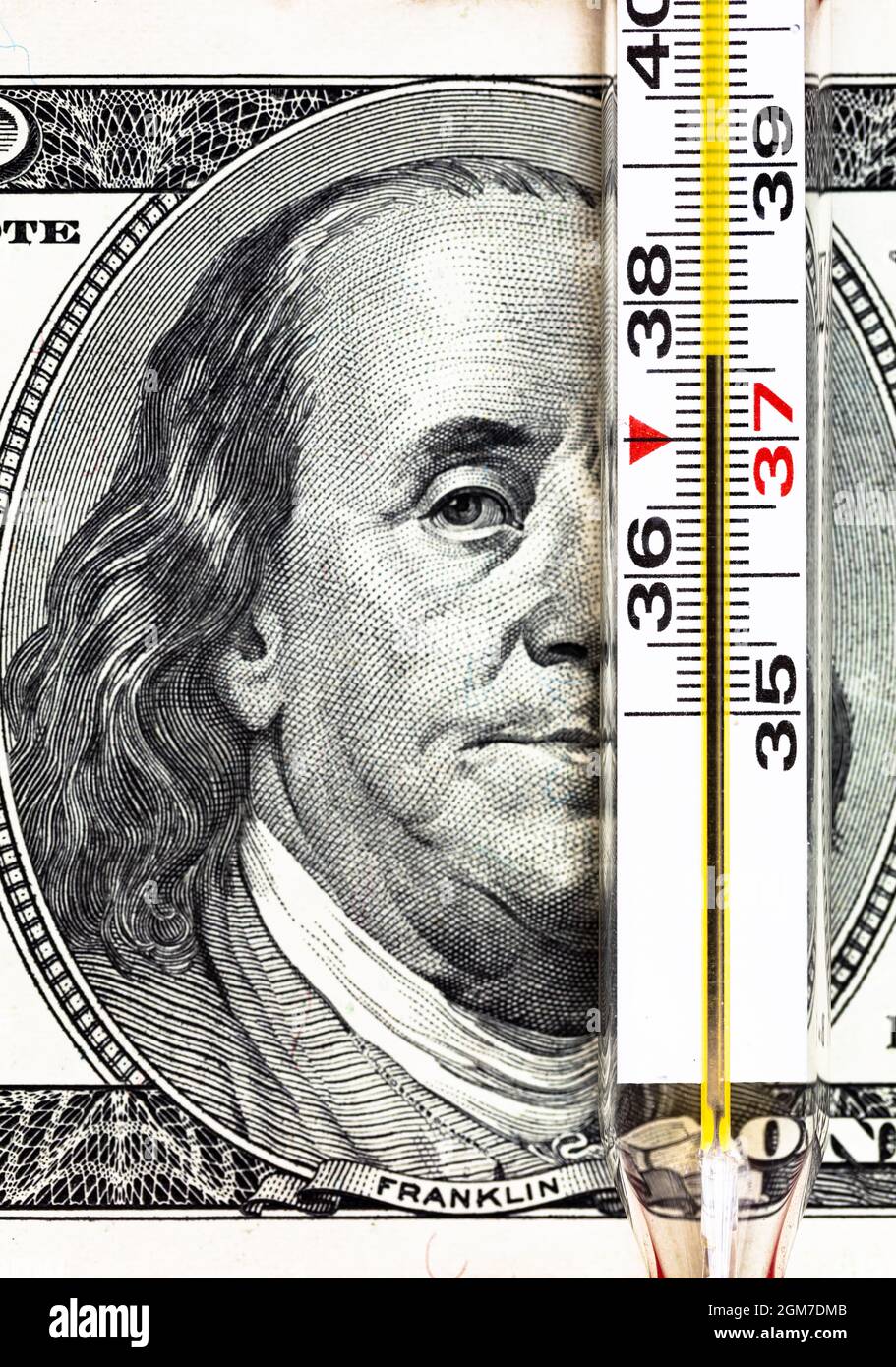 100 dollar bill and thermometer Stock Photo Alamy