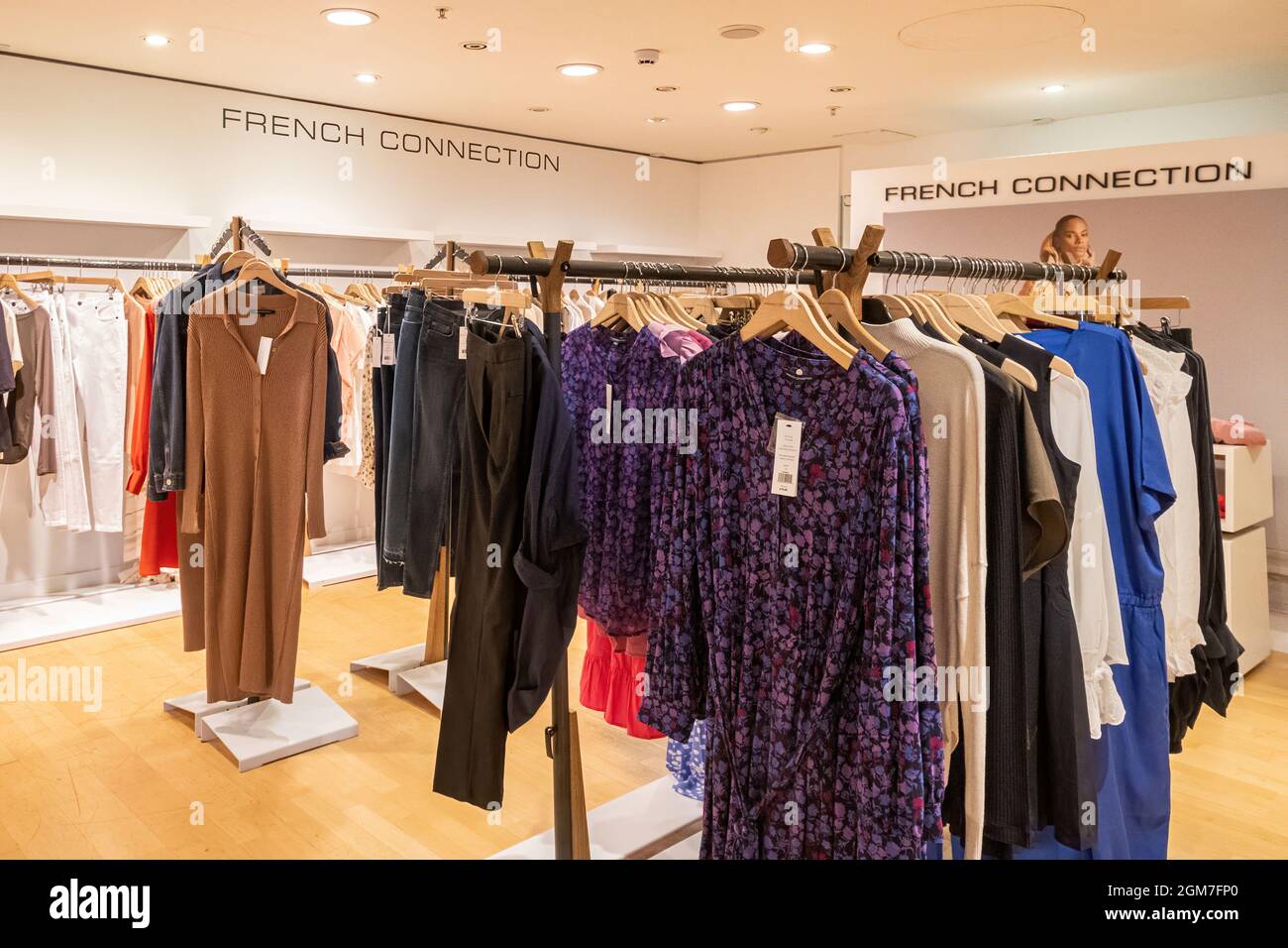 Interior of House of Fraser Department Store in Guildford, Surrey, England, UK. French Connection department with clothing on display. Stock Photo