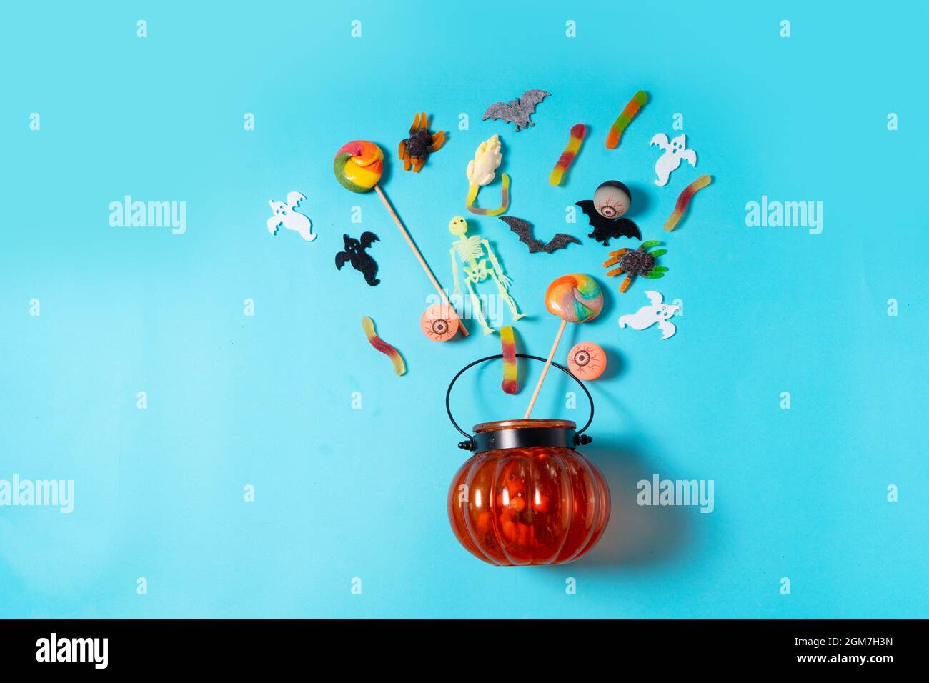 Halloween scene on orange background Stock Photo - Alamy