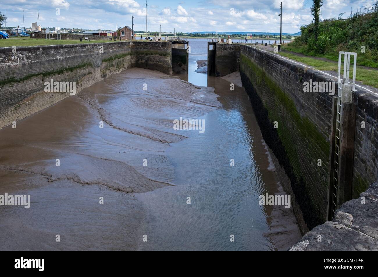 Low tide in the first lock at Lydney Harbour from the Severn estuary in Gloucestershire, England, UK. 2021 Stock Photo