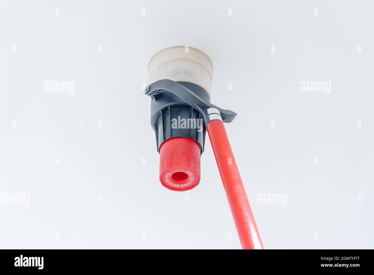 Automatic smoke detector fire alarm head on the ceiling. The smoke