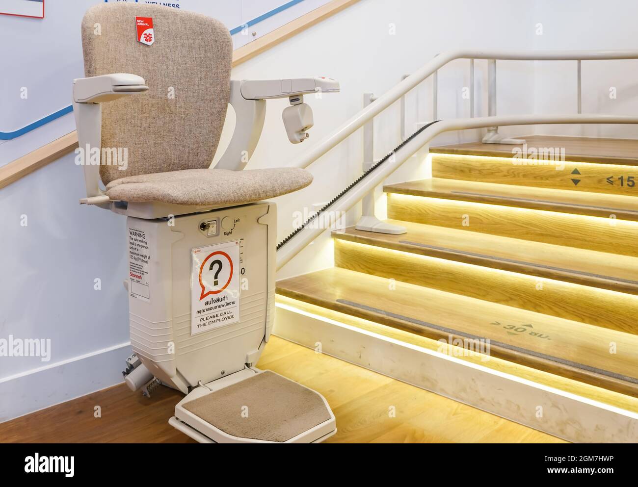 Automatic stair lift on staircase for elderly people and disabled