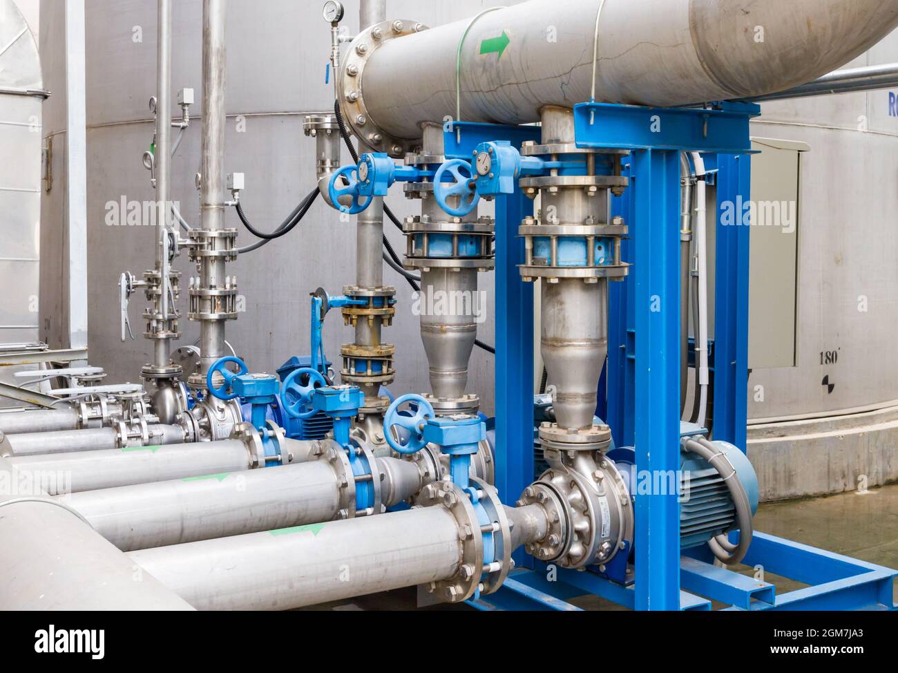 Water pump station and pipeline on roof deck of water tank for