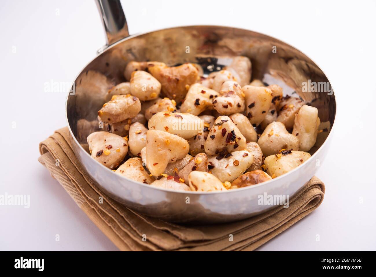 Stir fried water chestnuts recipe or Singhara or Singoda fry Stock