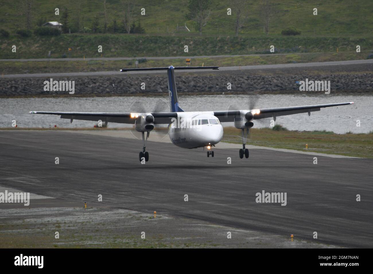 Air Iceland Connect Dash8-200 landing at Isafjördur airport Stock Photo