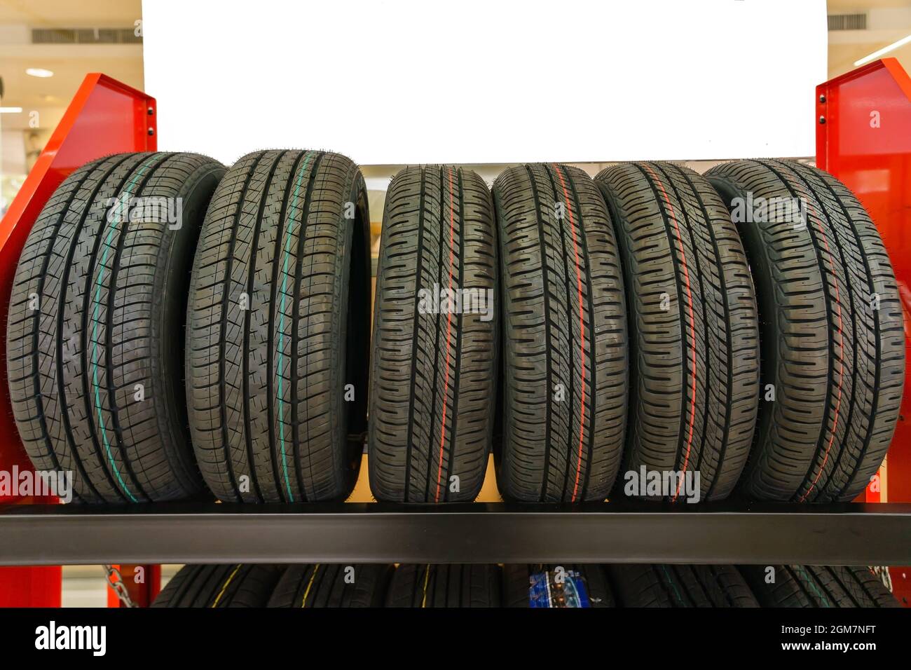 New tires for sale at a tire store Stock Photo Alamy
