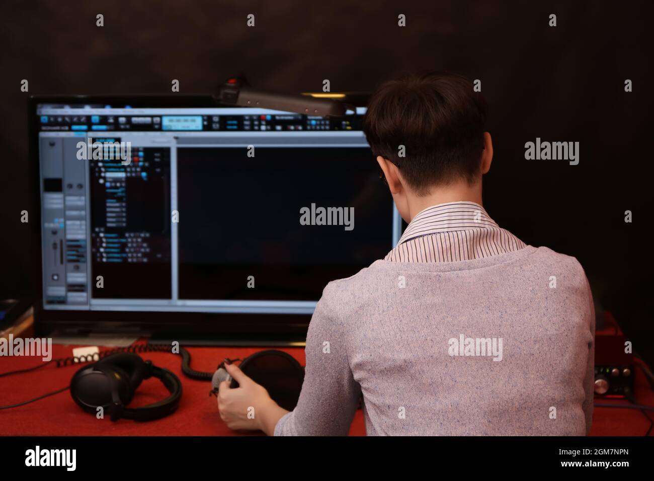 Sound engineer working at radio station Stock Photo - Alamy