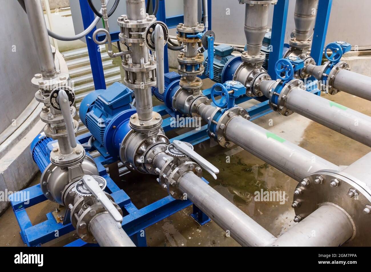 Water pump station and pipeline on roof deck of water tank for