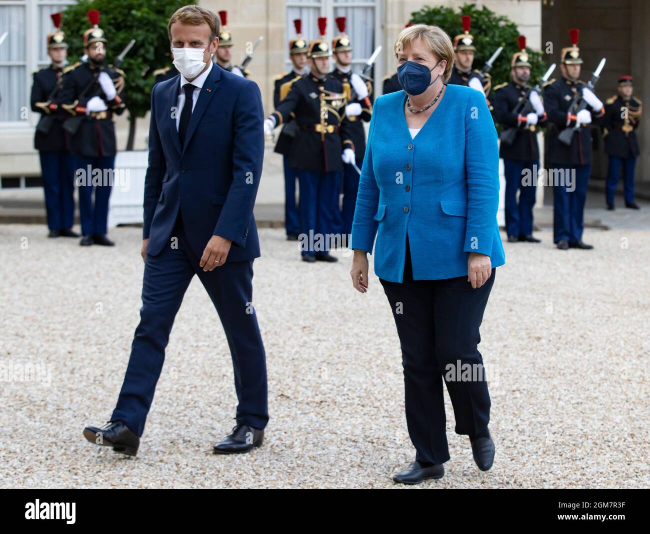 Paris, France. 17th Sep, 2021. French President Emmanuel Macron welcomes German Chancellor Angela Merkel upon her arrival at the Elysee Palace in Paris, France, Sept. 16, 2021. Credit: Xinhua/Alamy Live News Stock Photo