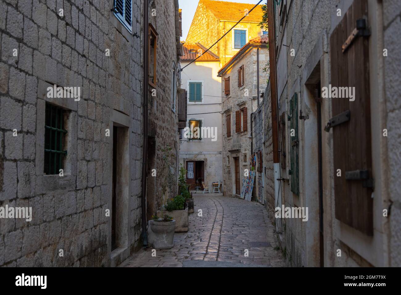 The narrow cobbled street of Stari Grad town on Hvar island, Croatia Stock Photo