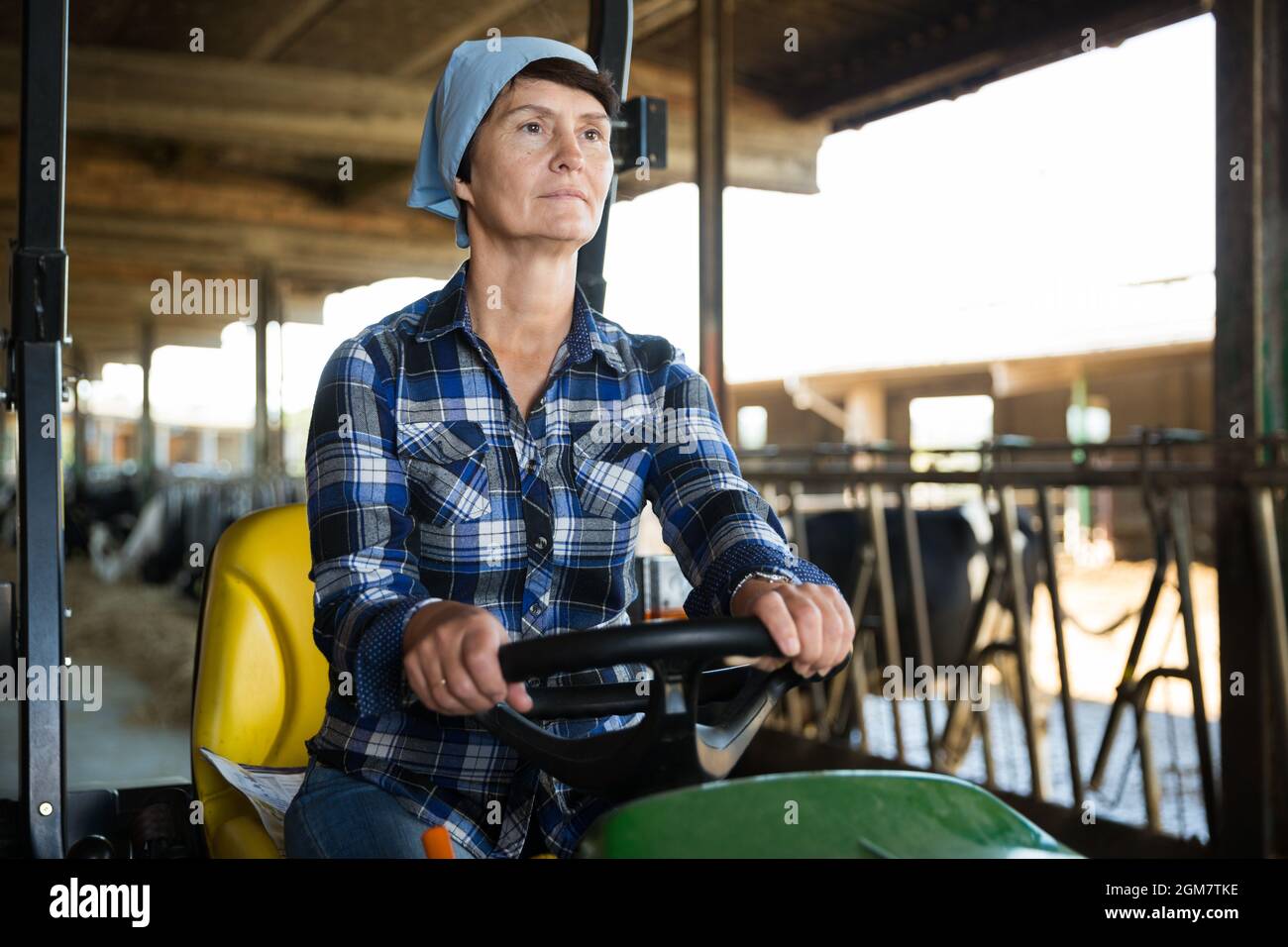 Portrait of female farmer in the special car Stock Photo - Alamy