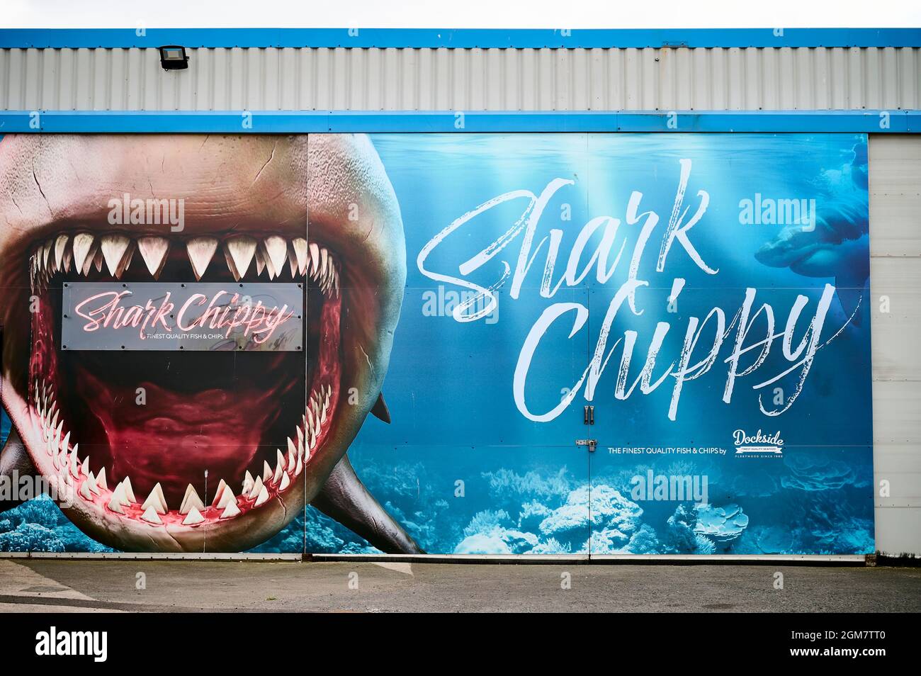 Sign for the Shark Chippy on the dockside at Fleetwood Stock Photo - Alamy