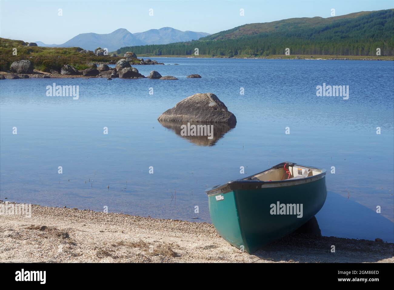 Canadian canoe on beach at Loch Laidon, Scottish Highlands, Scotland