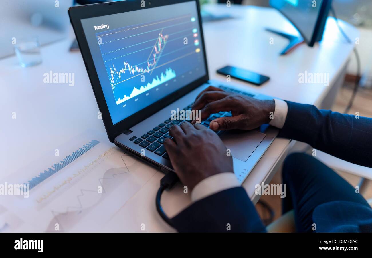 Close up of business trader man working on crypto currency markets with blockchain technology - Decentralized finance and stock exchange concept Stock Photo