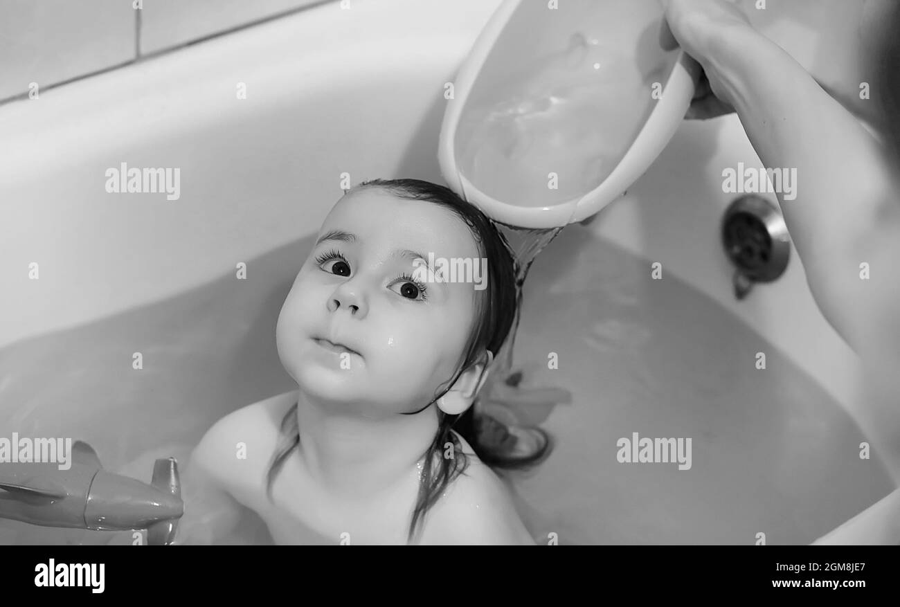 Young children take a bath. Children wash in bathroom. Brother and