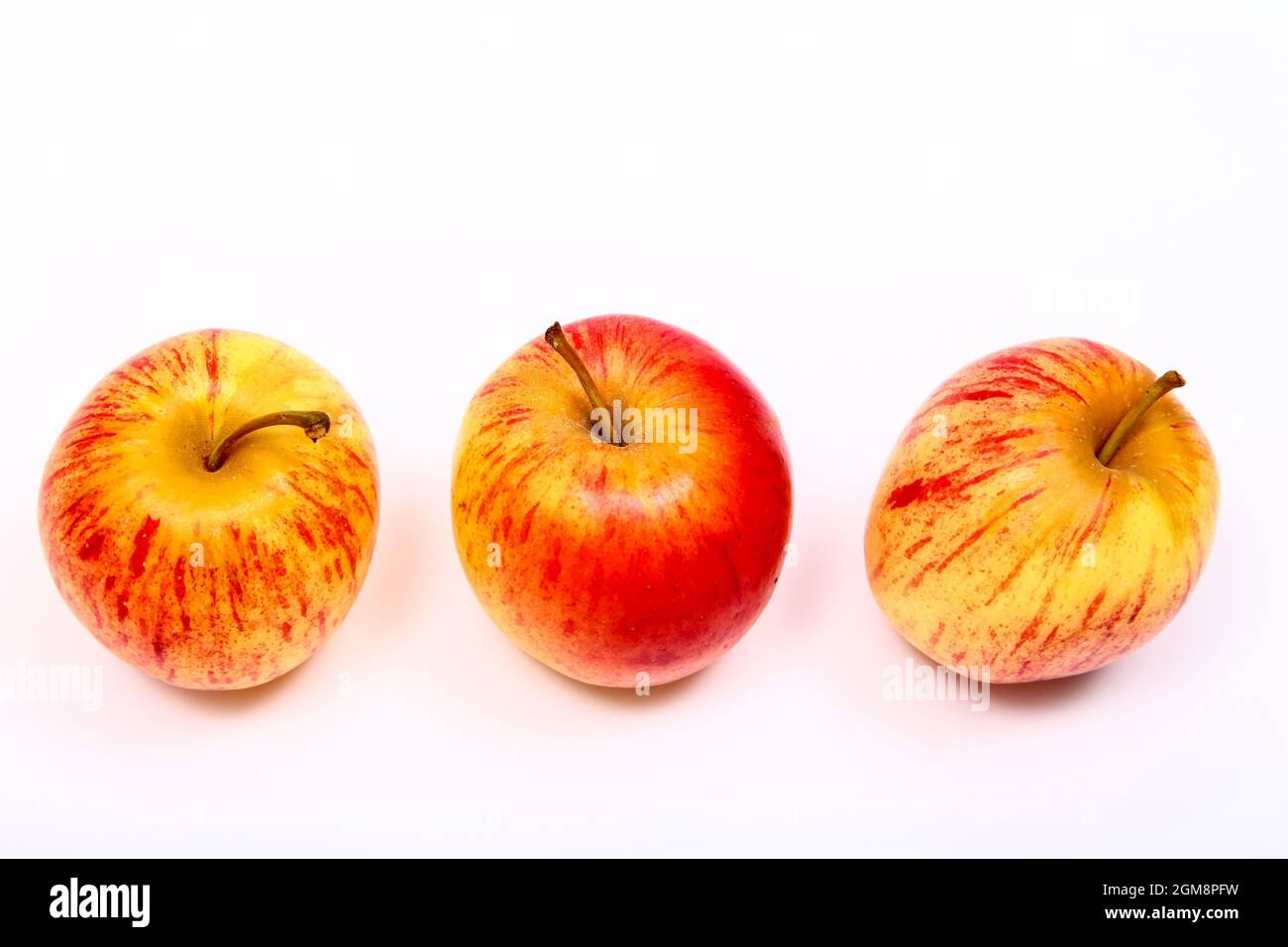 Three ripe eating apples isolated on a white background Stock Photo