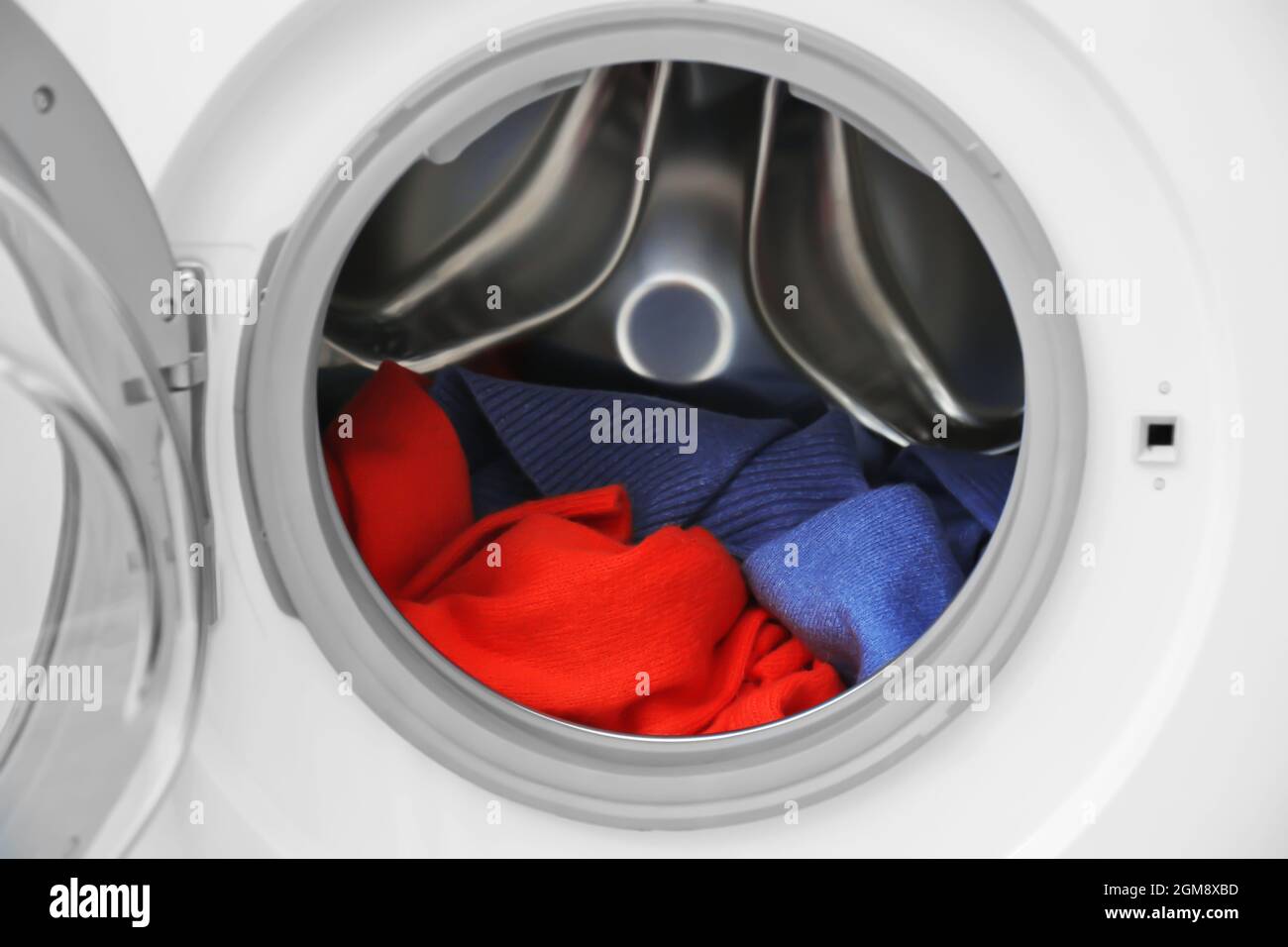 Laundry in washing machine, closeup Stock Photo Alamy