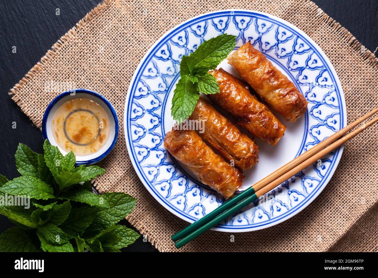 Food concept Vietnamese fried Rice paper spring rolls with mints on