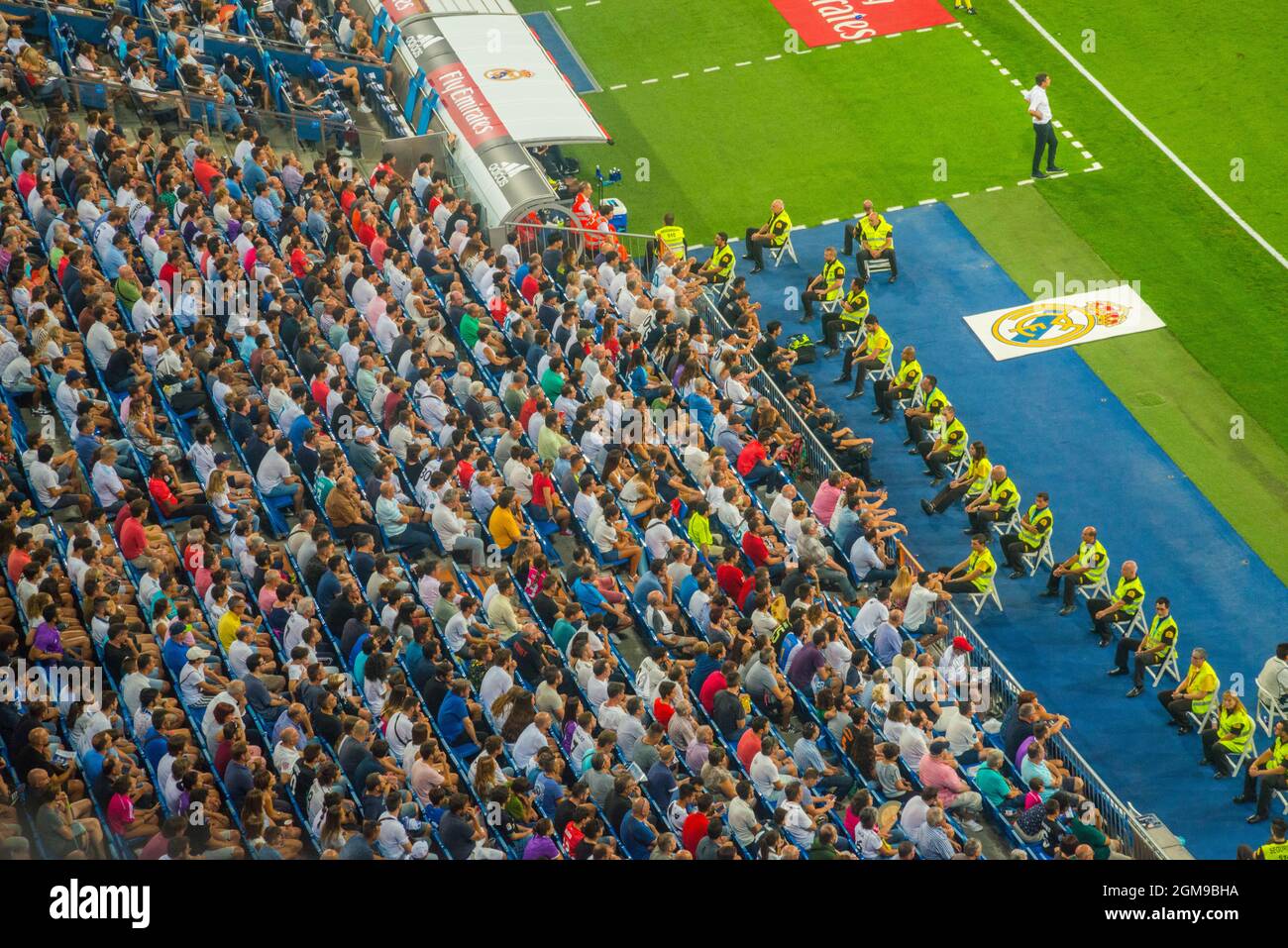 People during a football match.Santiago Bernabeu stadium, Madrid, Spain. Stock Photo
