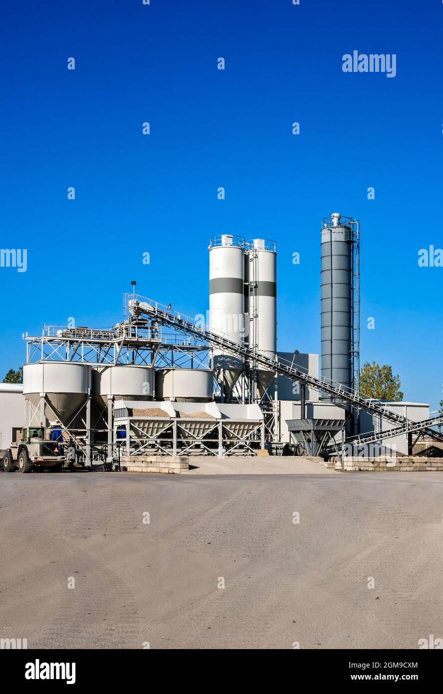 Construction industry concrete mixing batching plant and equipment. Stock Photo