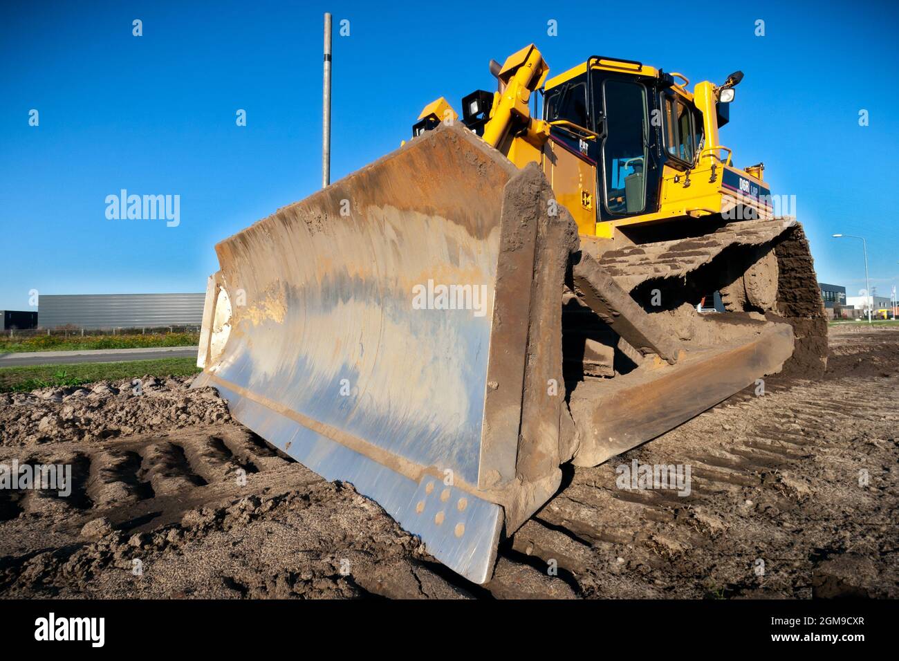Caterpillar D6 bulldozer at a construction site in The Netherlands. October 9, 2010 Stock Photo
