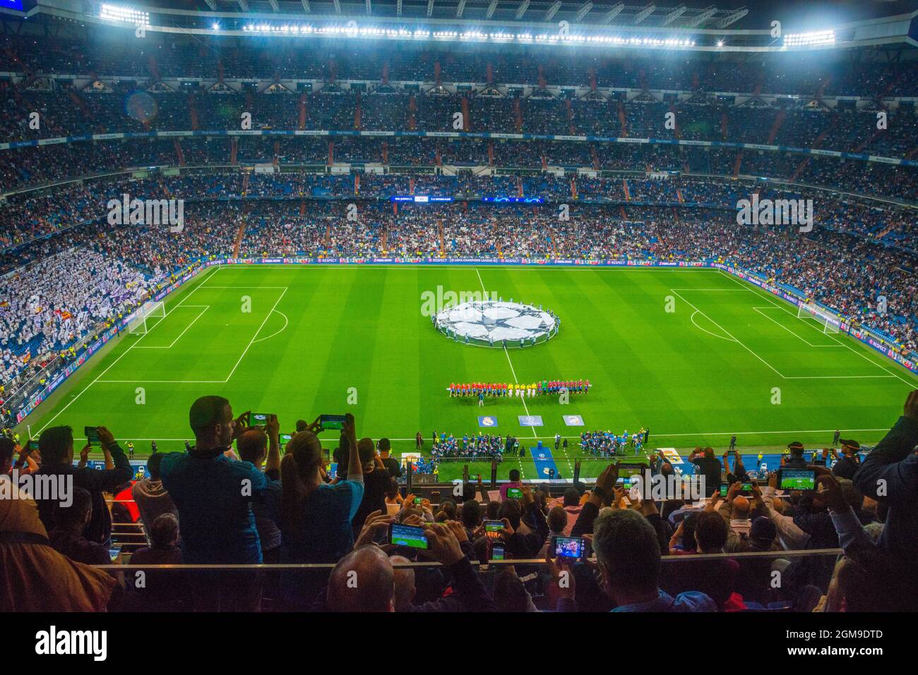 People at Santiago Bernabeu stadium during a football match. Madrid, Spain. Stock Photo