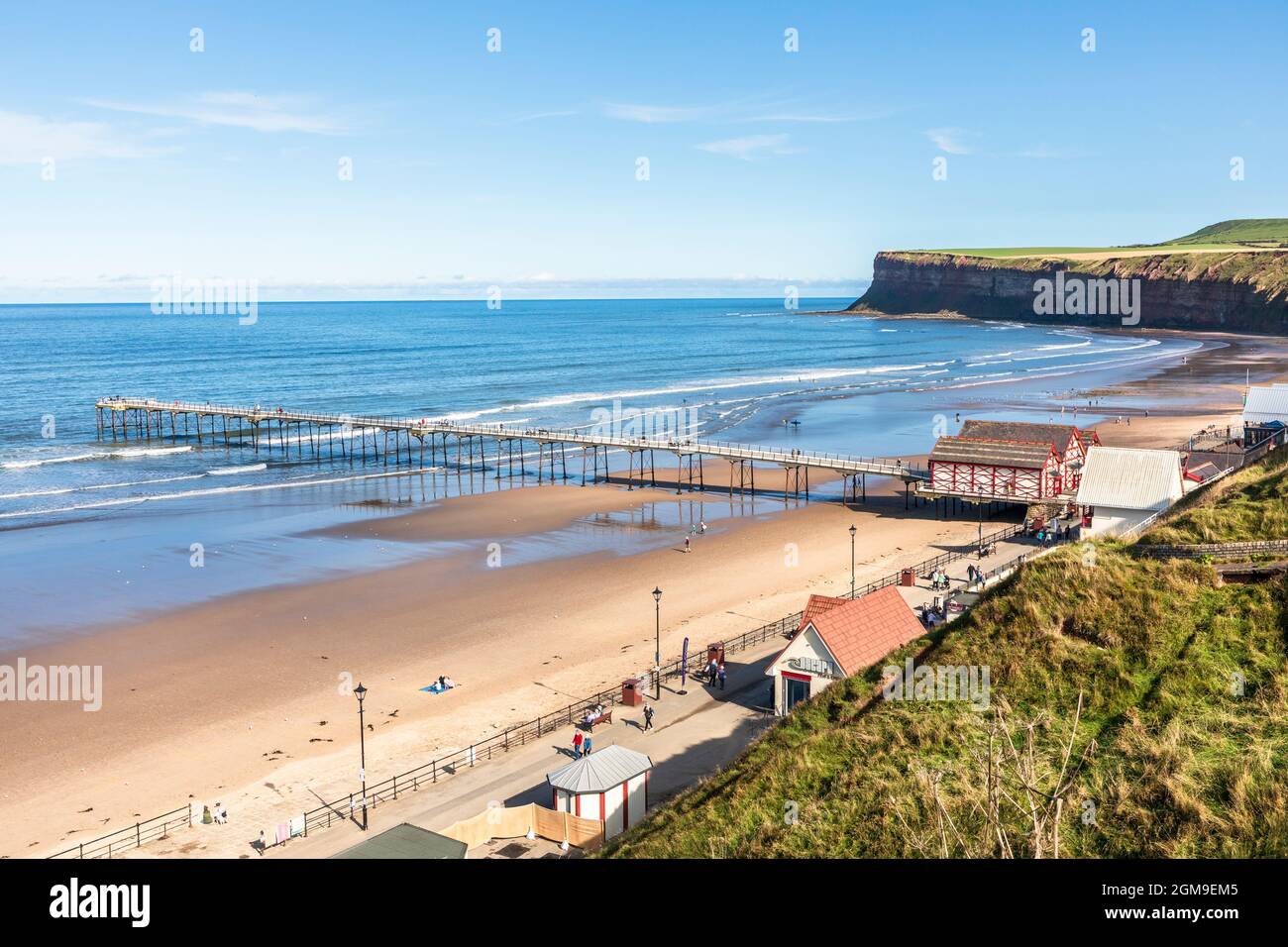 View towards Hunt Cliff Nature reserve, the highest cliffs on the north east coast of England and a famous seabird colony, over Saltburn beach Stock Photo