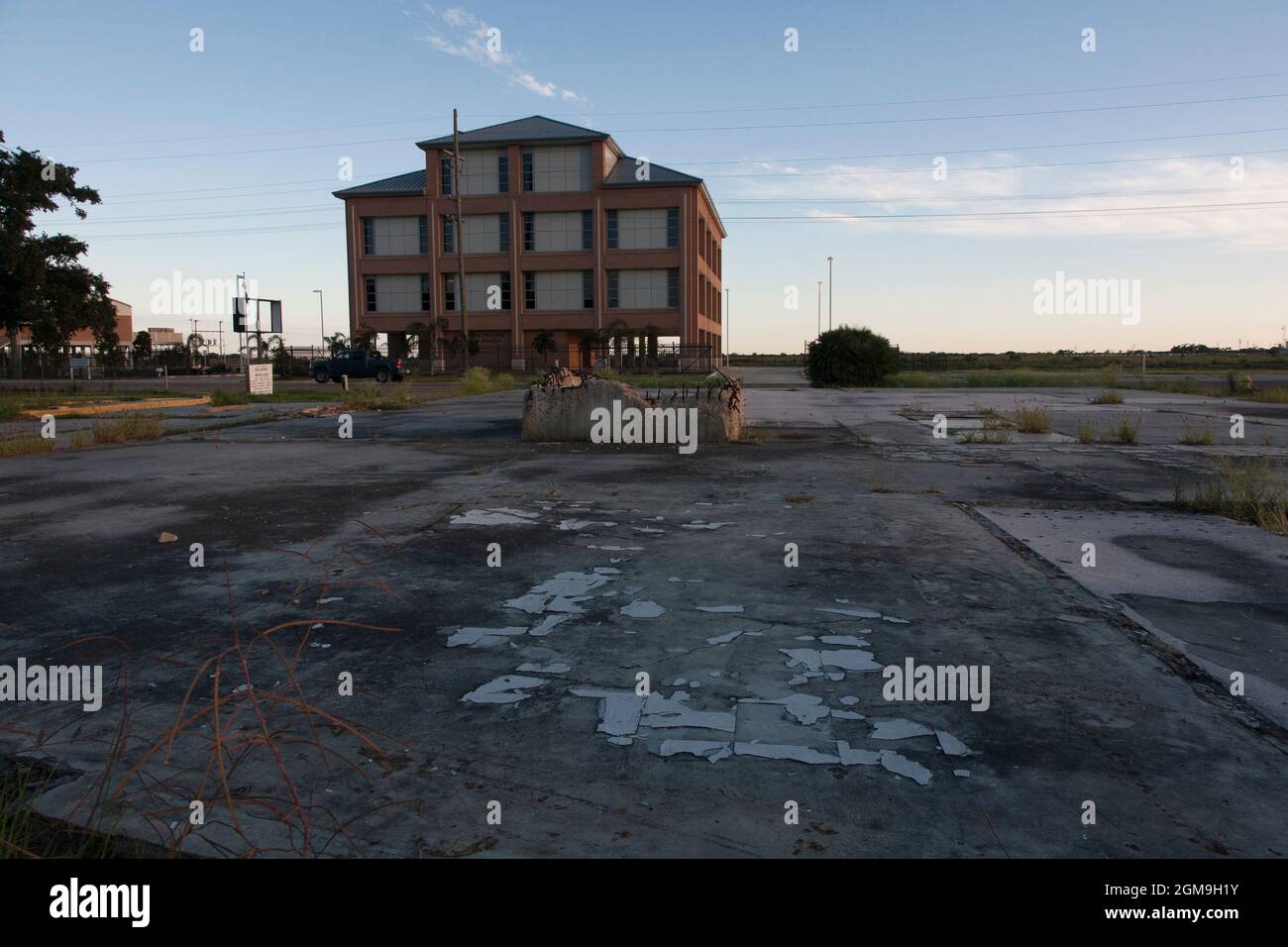 The Cameron Parish School Board building represents new construction in Cameron since Hurricane Ike devastated the town in 2008. But many empty slabs Stock Photo