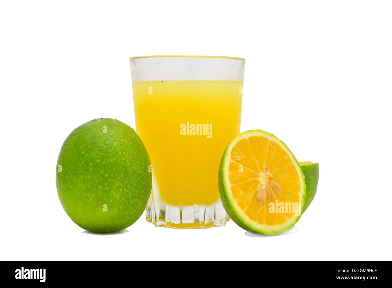 lemonade or lemon juice and cut fresh lemons isolated on white background, mousambi juice Stock Photo