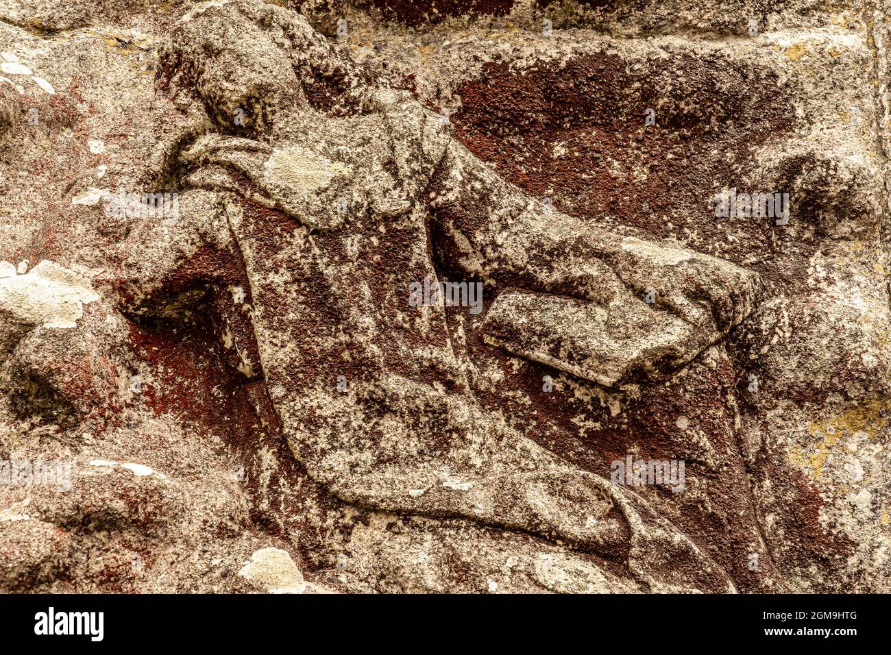 Old statue in the ground Stock Photo Alamy