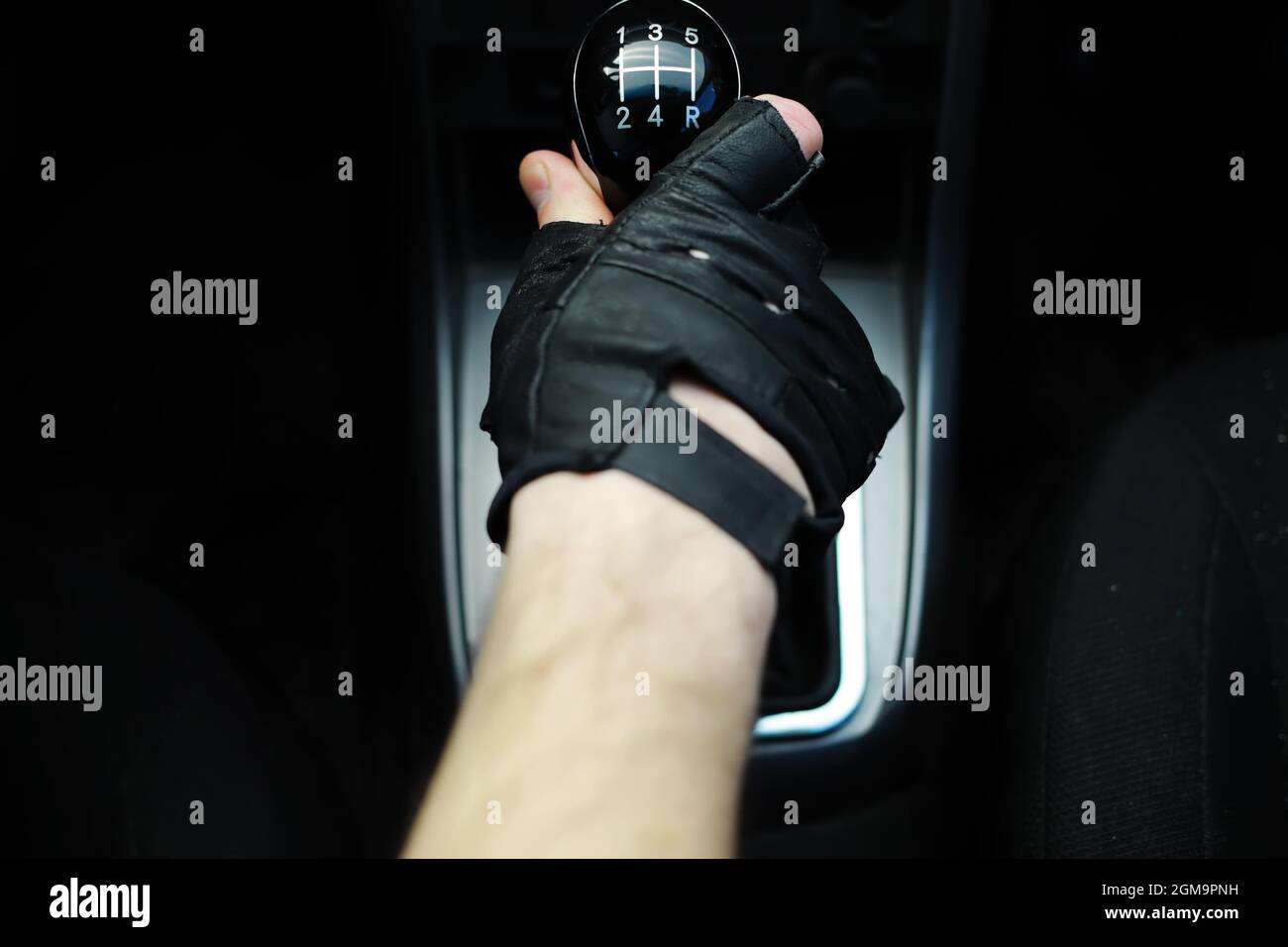 Gear lever. Manual Transmission. Hand on the gear shift in the car ...