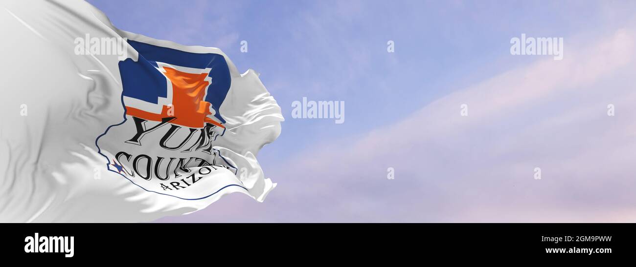 flag of county Yuma, Arizona , USA at cloudy sky background on sunset
