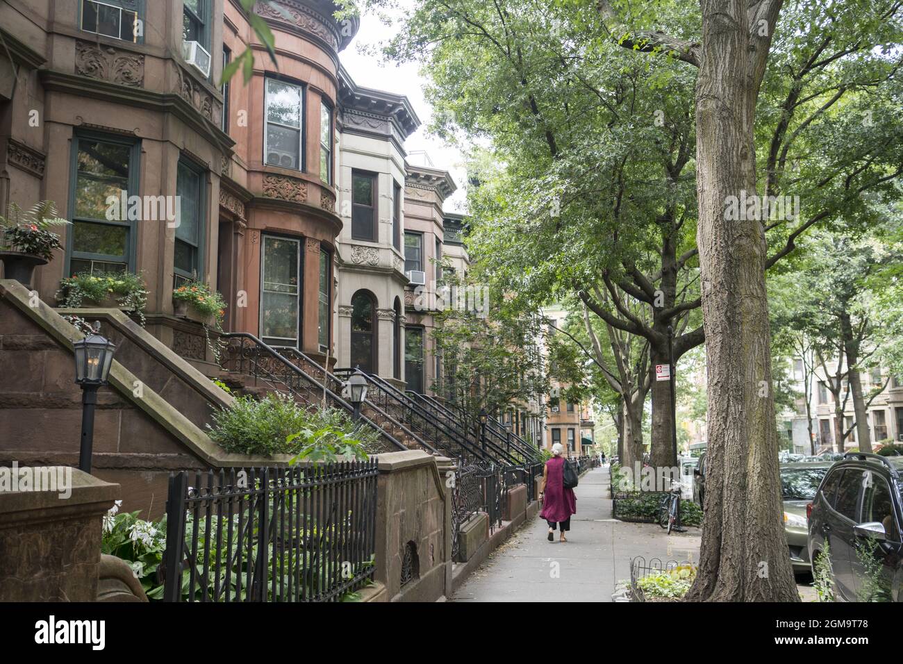 Classic brownstone buildings along a residential street in the Park Sope neighborhood of Brooklyn, New York. Stock Photo