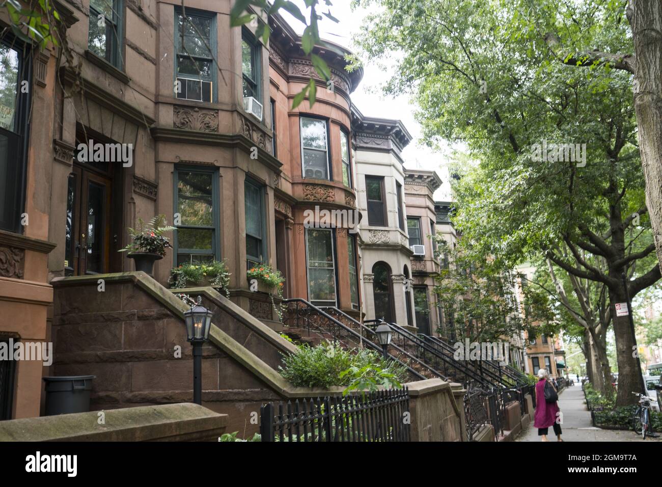 Classic brownstone buildings along a residential street in the Park Sope neighborhood of Brooklyn, New York. Stock Photo